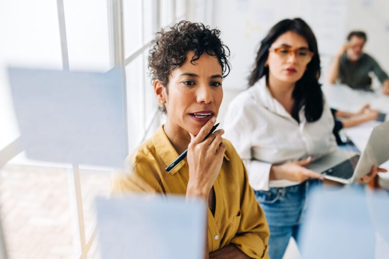 Woman looking at vision board