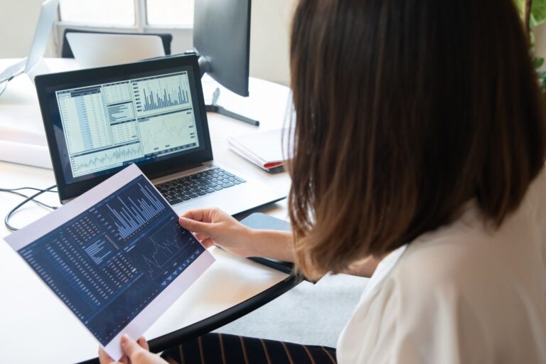 Woman looking at charts